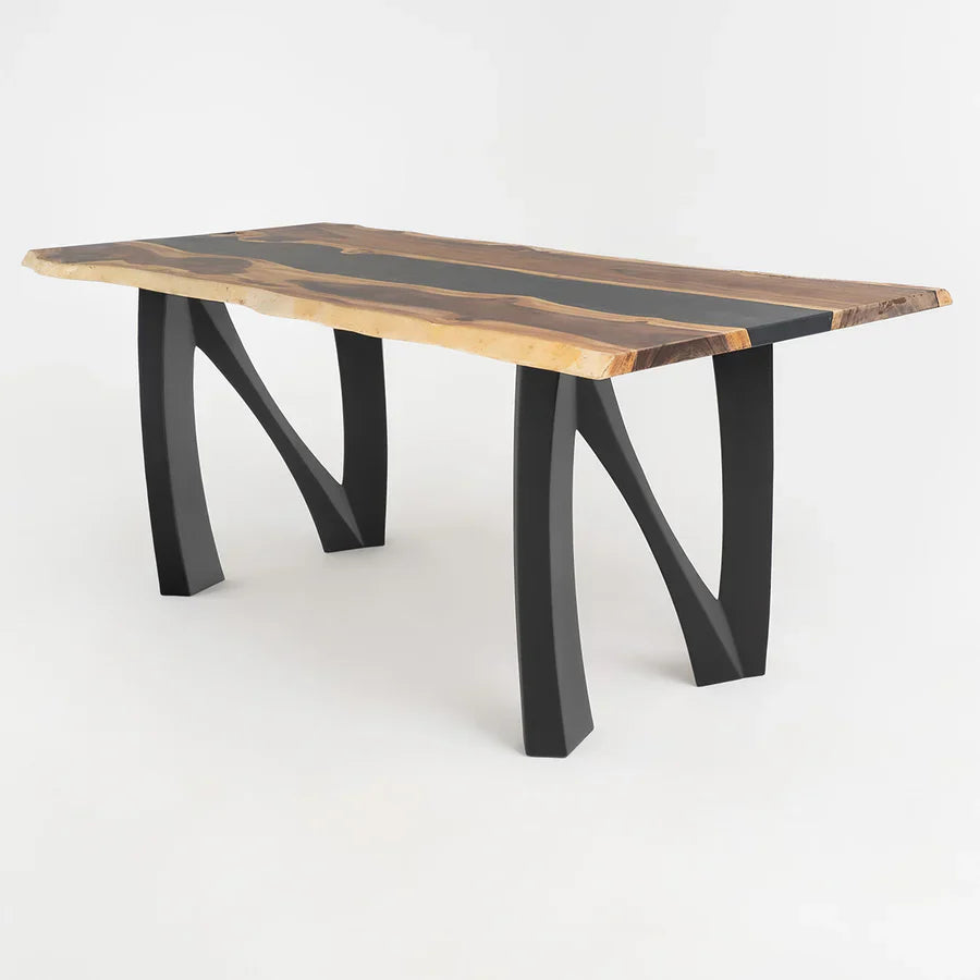 Front view of Noah Metal Table Legs featuring a sculptural alphabet-inspired steel design, matte black powder-coated finish, reinforced frame structure, and integrated adjustable levelers