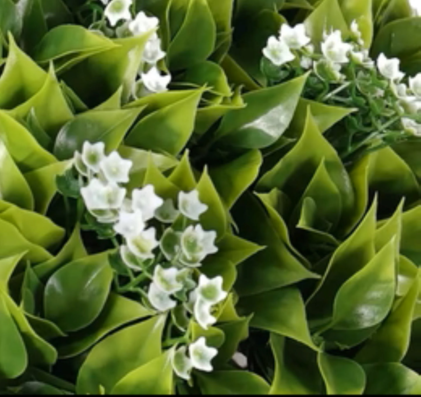 Faux green and white flowering basket for patio or entryway