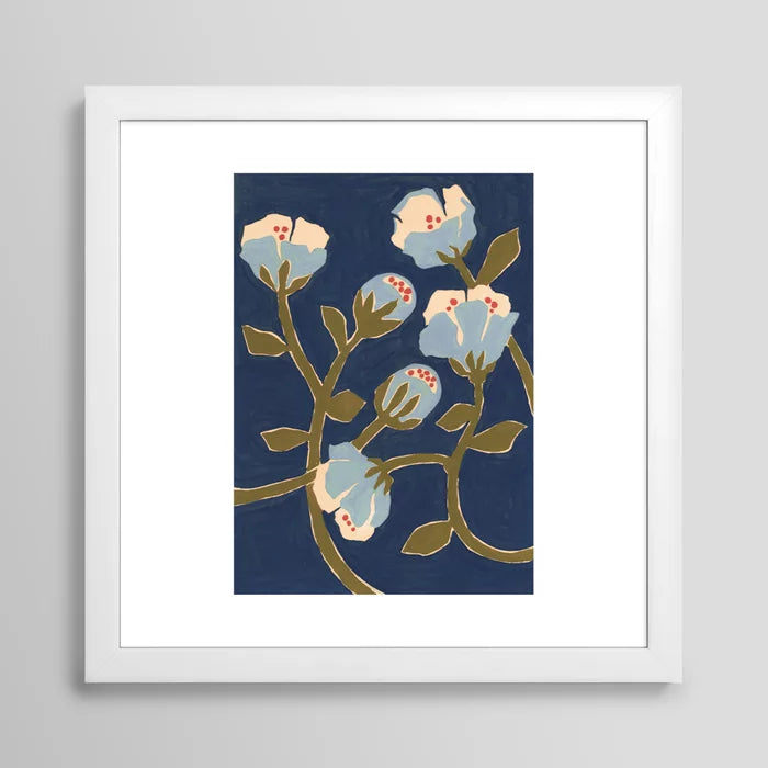 Blue Perennial Art Print by Megan Galante framed in white hardwood, showcasing a clean, airy floral composition ideal for coastal cafés, hotel rooms, and spa interiors.