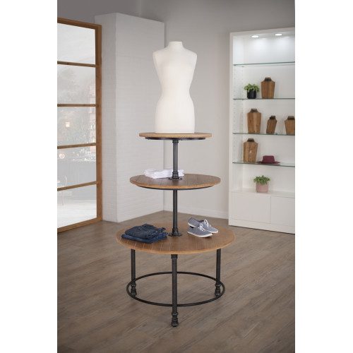Three-tier round table with distressed pine top and metal base, ideal for rustic, vintage-style retail displays.