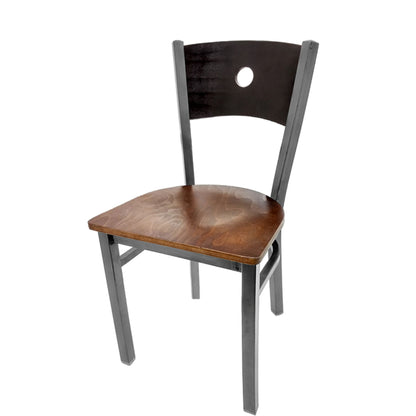 Dining chair with black wood back and walnut wood seat.