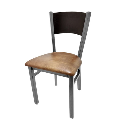 Dining chair with black stain seat back and buckskin vinyl seat.