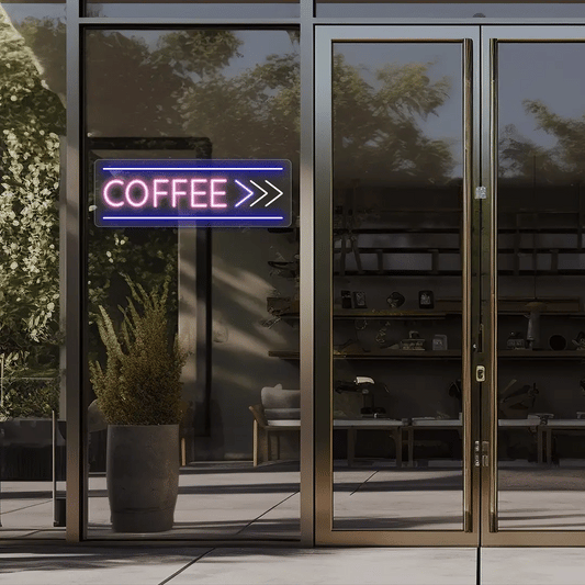 Neon coffee sign outside a building with glass doors.