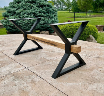 Side view of industrial farmhouse steel table legs featuring 1.5 x 3 inch steel tubing, 6 x 28 inch mounting plate, 4 x 4 inch center beam opening, and adjustable threaded feet for leveling