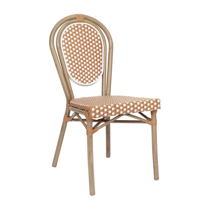 Parisian woven rattan chair with natural-and-white pattern and rustic bamboo-look frame.