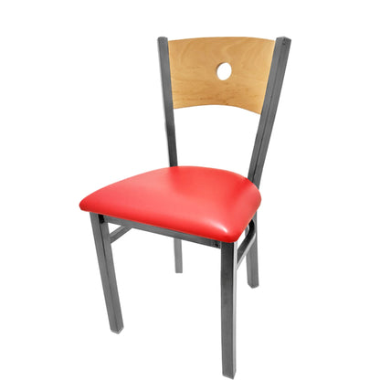 Dining chair with natural wood back and red vinyl seat.