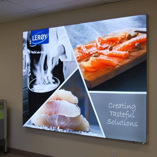 Slim LED graphic light box with clear front lens designed for wall-mounted illuminated displays