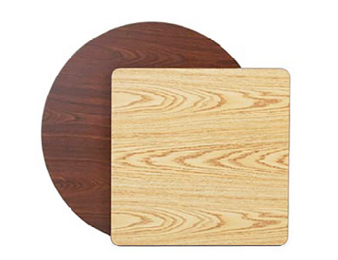 Reversible restaurant table top displaying oak finish on one side and walnut finish on the other.”