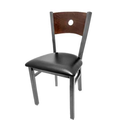 Dining chair with walnut wood back and black vinyl seat.
