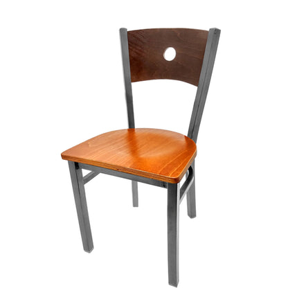Dining chair with walnut wood back and cherry wood seat.