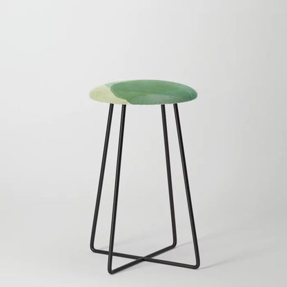 Abstract Organic Watercolor Shapes in Green Counter Stool by Apricot-Birch with black steel legs – artistic seating for hotel lounges, restaurants, and café interiors