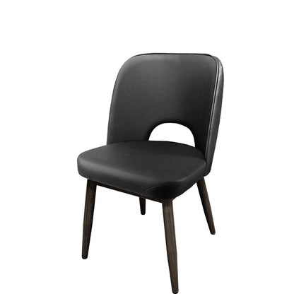 Amata restaurant chair with faux driftwood metal frame and black vinyl cutout seat – commercial-grade indoor seating for restaurants and bars.