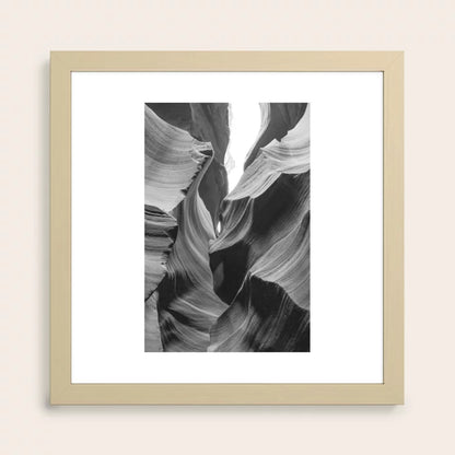 ANTELOPE CANYON XXIII Arizona Desert Art Print by Nicole Alexandria Prints framed in natural maple wood, highlighting desert tones for restaurants, hotel lobbies, and coffee houses with a warm modern aesthetic