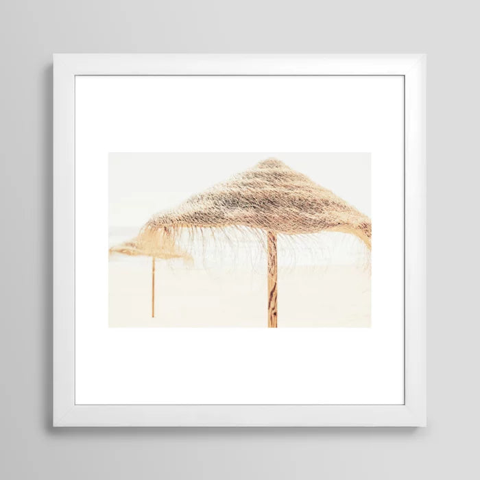Beach Dreams III art print in white frame displayed in café interior