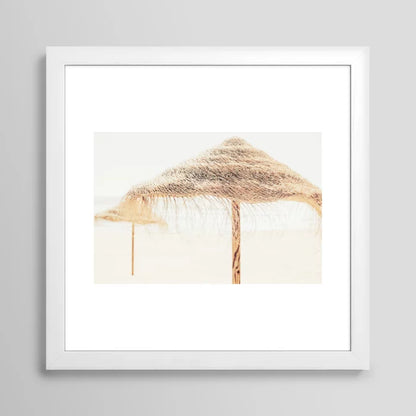 Beach Dreams III art print in white frame displayed in café interior