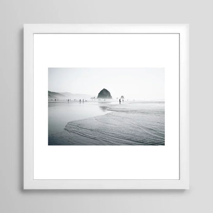 Cannon Beach Art Print by Hannah Kemp in white frame showcasing soft coastal colors and clean lines, ideal wall décor for hotels, coffee houses, and coastal restaurants.