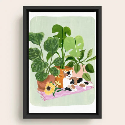 Cat and Plants Still Life Canvas Print by Sabina Fenn framed in black wood for modern cafe decor