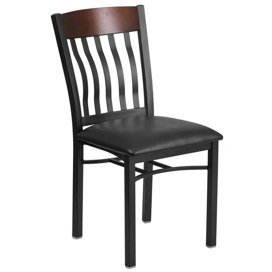 Commercial metal dining chair with walnut vertical slat back and black vinyl padded seat.