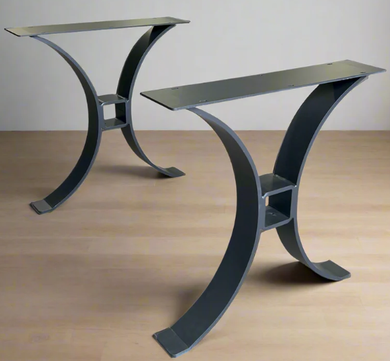 Front view of curved timber beam table leg set in heavy-duty flat black powder-coated steel, showing the 28-inch height, wide curved beam design, and full-length 8x28-inch mounting plate for bar and restaurant tables.