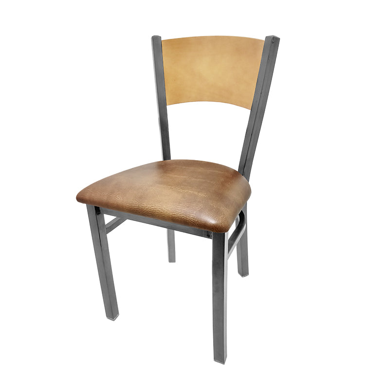 Dining chair with natural finish seat back and buckskin vinyl seat.
