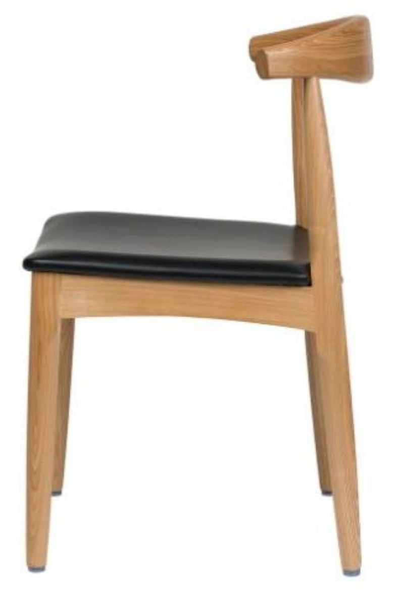 Side view of Elbow Dining Chair highlighting the metal frame with wood grain finish, contoured backrest, and padded black vinyl seat.