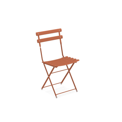 Emu Arc en Ciel E314 steel folding chair in maple red finish, ideal for bistro patios and contemporary outdoor dining areas.