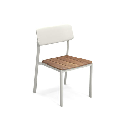 Emu Shine E247T stacking side chair in white aluminum with natural teak seat and back, ideal for modern patios, cafés, and coastal dining spaces.
