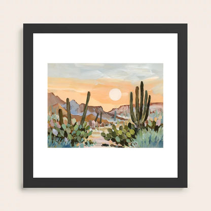 Glowing Desert Moon Tucson Art Print by Shina Choi Art in black frame, featuring a glowing moon over desert hills, perfect modern wall art for hotels, cafés, and upscale restaurants.