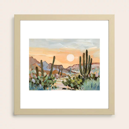 Glowing Desert Moon Tucson Art Print by Shina Choi Art in maple wood frame, offering warm desert hues and natural texture, designed for restaurants, bars, and hotel suites.