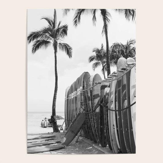 Black and white Hawaiian surfboards photography poster displayed in café interior