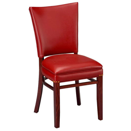 Justin upholstered beech wood dining chair in medium walnut finish with cream vinyl seat and decorative nail trim. Custom wood stains and upholstery colors available. Made in the USA for restaurant and hospitality interiors.