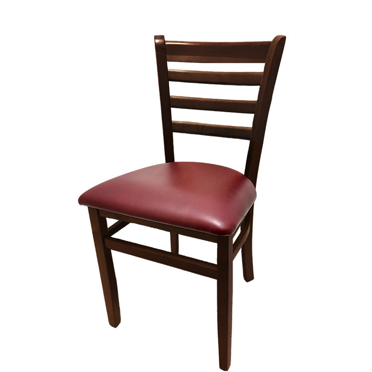 Ladderback dining chair with walnut frame and wine vinyl seat.