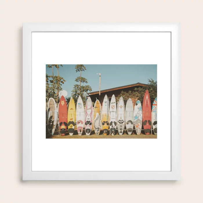 Lets Surf XV art print in white frame styled in café seating area