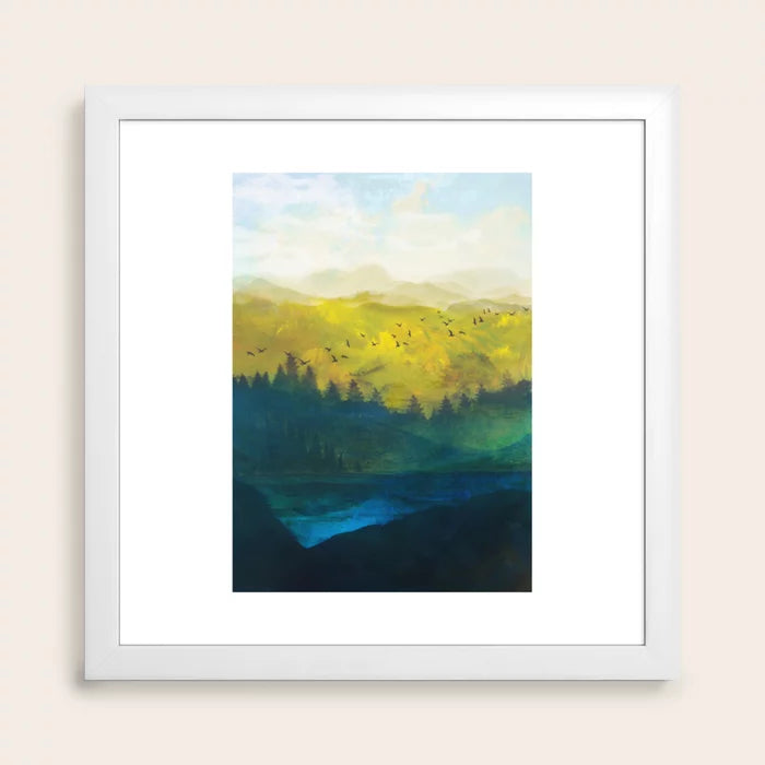 Mountain Lake Art Print by Nadja in white frame, bright and minimal landscape art perfect for hotel suites, resort lobbies, and café walls.