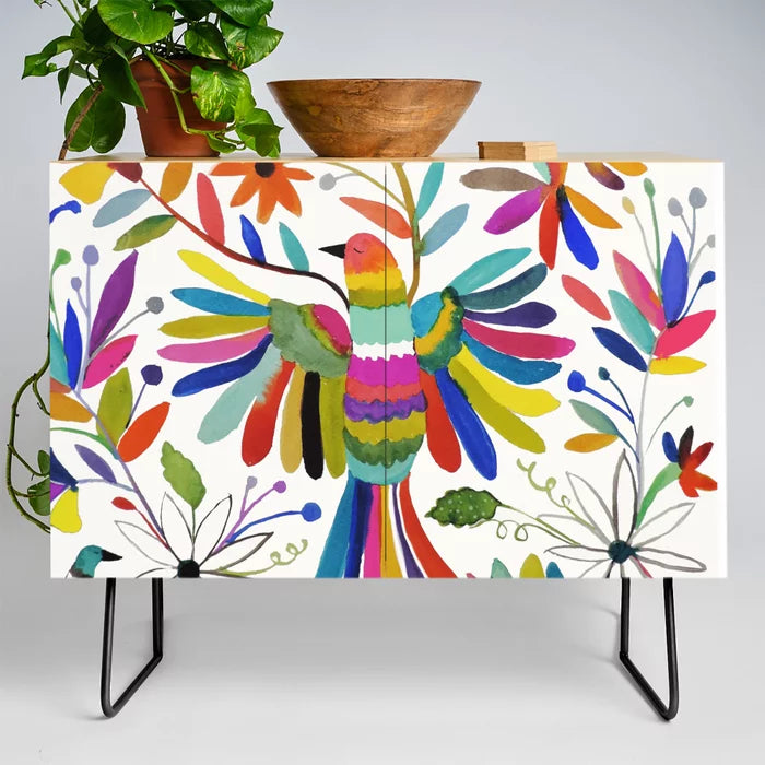 Otomi Bird Condiment Bar by Sylvie Demers with black steel legs – vibrant Otomi-inspired artwork on birch, perfect for restaurant condiment stations and boutique hotel interiors