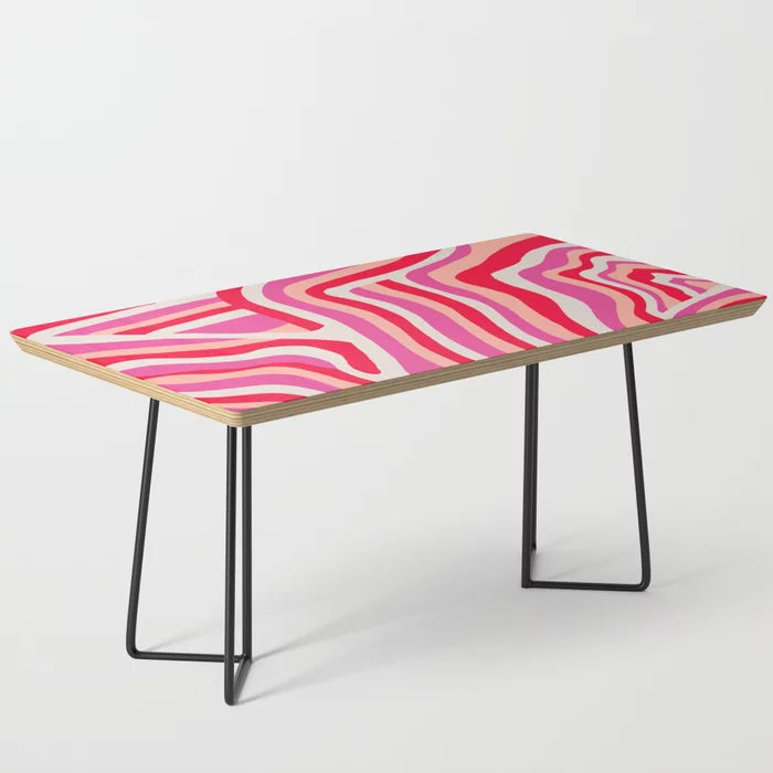 Pink Zebra Stripes Coffee Table by Sunshine Canteen with black steel legs – colorful boho-inspired table perfect for restaurant lounges, boutique hotels, and artistic café interiors