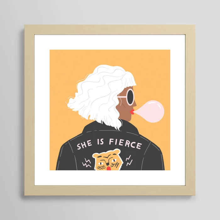 She Is Fierce Art Print by Charly Clements in a natural maple hardwood frame, printed on archival paper with matte finish for warm, minimalist interior styling.