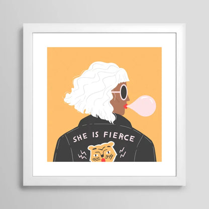 She Is Fierce Art Print by Charly Clements in a white frame, showcasing a soft modern aesthetic on museum-quality paper for contemporary home or office décor.
