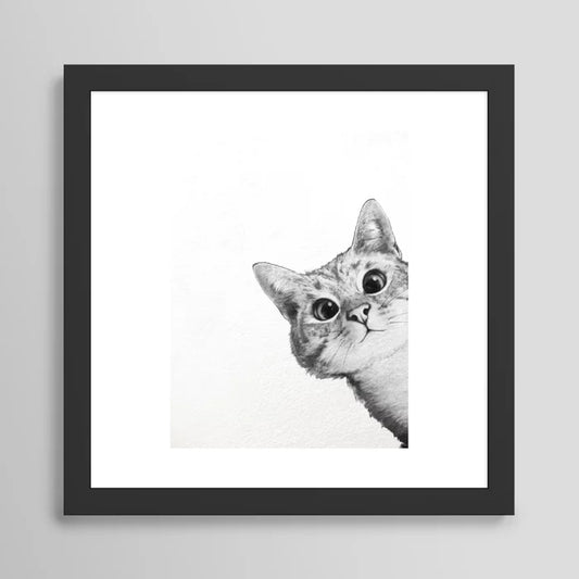Sneaky cat framed art print in black frame, playful wall décor for cafés, restaurants, and boutique hotels