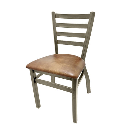 Front view of ladderback metal chair with clear coat frame and buckskin vinyl seat, stackable commercial chair with brass weld accents.