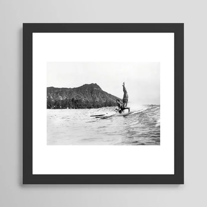Surfing Diamond Head, Hawaii Art Print by Vintage Surf Photos framed in black wood – vintage surf photography wall art featuring Waikiki beach and Diamond Head in Hawaii