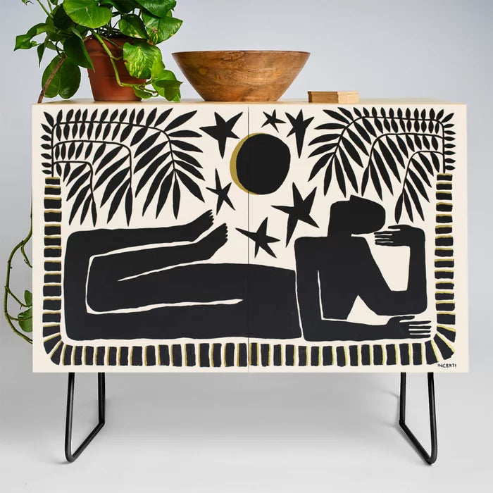 The Loneliness Condiment Bar by João Incerti with black steel legs – expressive birch cabinet with colorful artwork ideal for restaurant condiment stations and boutique hotels