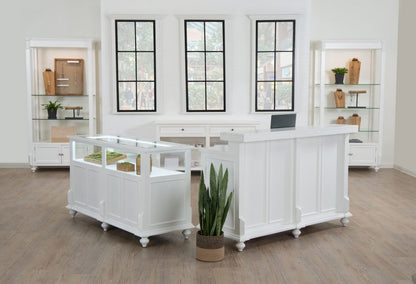 Front view of the Vintage Back Cash Wrap in a white painted finish, showing the countertop and adjustable shelves used for retail checkout and packaging tasks.