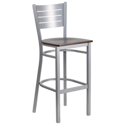 Commercial walnut bar stool with metal slat back and silver steel frame. Heavy-duty seating ideal for restaurants, bars, cafés, hotels, and indoor hospitality spaces.
