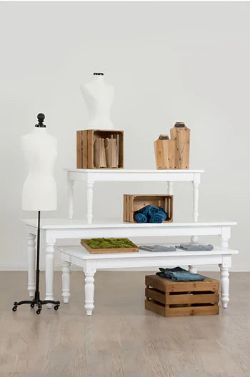 White finish color option showing a smooth painted wood surface used for farm-style retail display tables.