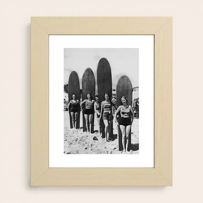 Woman Surfers vintage black and white surf art print by Vintage Vivian with light maple frame bringing warm natural tones to beach-inspired spaces