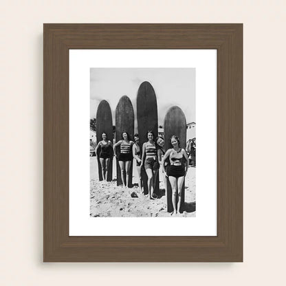 Woman Surfers black and white ocean photography print by Vintage Vivian framed in rich walnut wood for elegant coastal and vintage homes