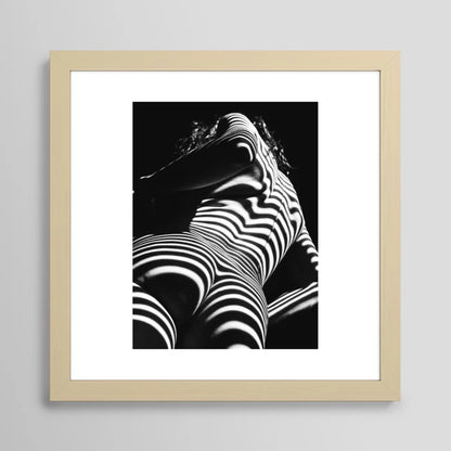 Zebra curve nude art print with maple frame, warm modern artwork for restaurants, wine bars, and hotel suites