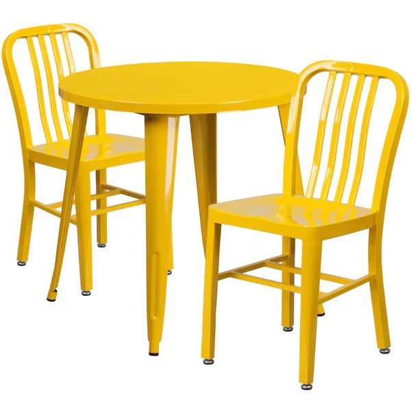 Yellow metal table and chairs on a white background